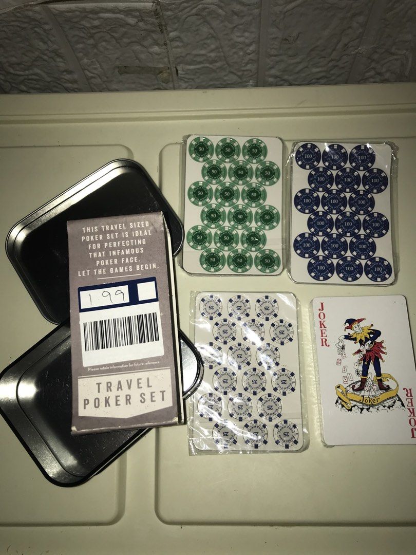 Travel Poker Set (Category: Board Games & Puzzles) located in Pilar. Submitted by dhelsomera20308 (Listing ID 1437833970, Image 2). Description: - Travel-sized poker set - Includes poker chips and a deck of cards - Comes in a durable metal tin - Features a "Who Dares Wins" design - Ideal for travel and perfecting your poker face.