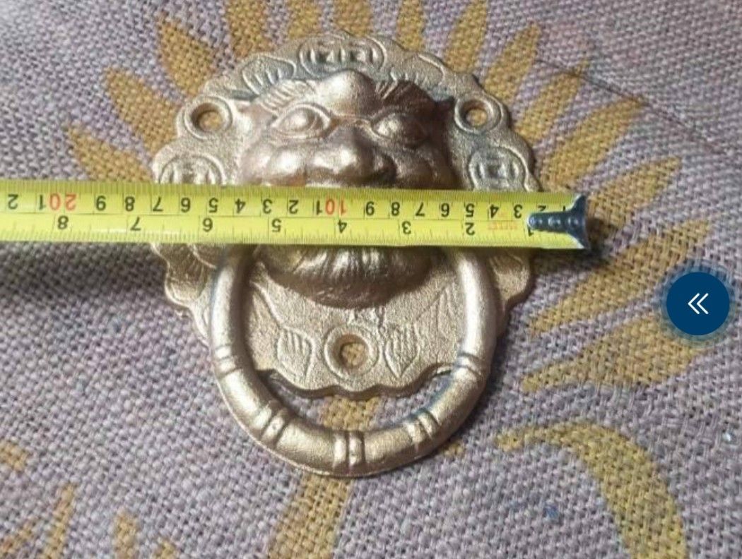 Vintage Brass Lion Door Knocker (Category: Other Home Decor) located in Manila. Submitted by erica111591 (Listing ID 1437814828, Image 2). Description: - Vintage brass lion door knocker - Detailed design - Approximately 6 inches wide - Includes mounting hardware.