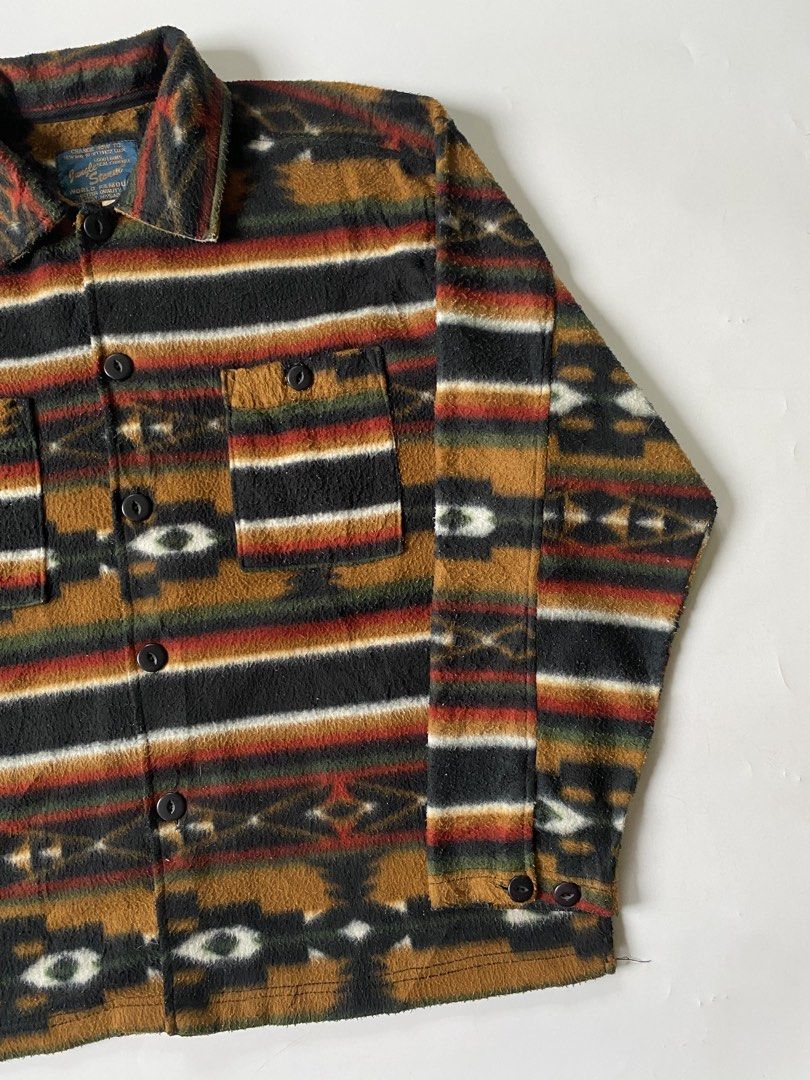 Vintage Jungle Storm Navajo Fleeced Jacket (Category: Coats, Jackets and Outerwear) located in Baguio. Submitted by the_gunstore (Listing ID 1437894184, Image 2). Description: Size tagged: Issue: None Width:25 Length:27.5 Shoulder:22 Sleeve:22.5.
