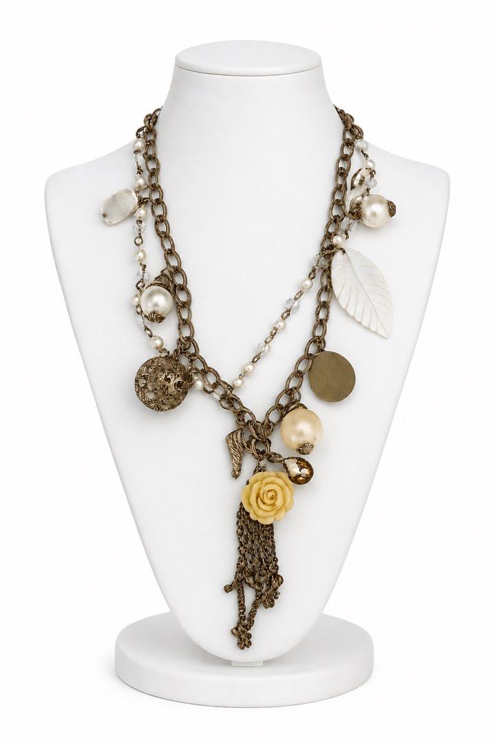 Vintage-Style Multi-Charm Necklace (Category: Necklaces) located in Quezon City. Submitted by secondcharm96 (Listing ID 1437771980, Image 1). Description: - Unique layered necklace - Features dainty faux pearls, leaf, and rose charms - Mix of textures and colors - Adds elegance to any outfit whether tees or dresses .