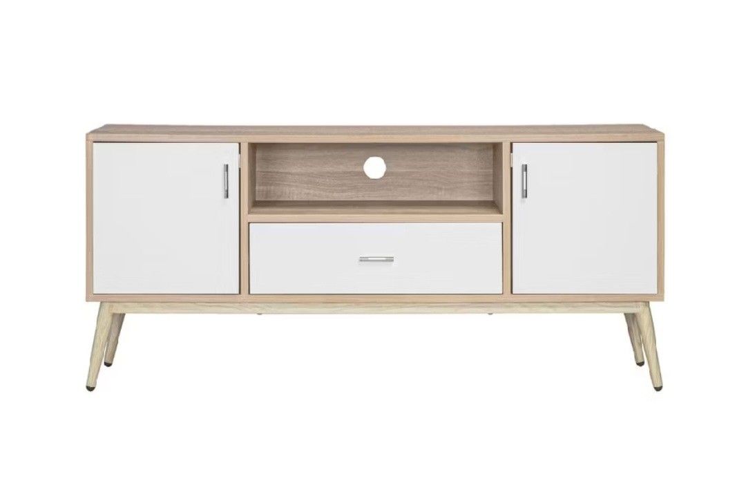 Wooden TV Cabinet with Storage (Category: Shelves, Cabinets & Racks) located in Manila. Submitted by imandreana33270 (Listing ID 1437907773, Image 3). Description: ✨ GARAGE SALE • PRE-LOVED ITEMS ✨ - Modern wooden TV cabinet - Two side cabinets for storage - Central open shelf for media players - One drawer for additional storage - Stylish light wood finish - White cabinet doors and drawer front - Supported by angled wooden legs - Perfect for you
