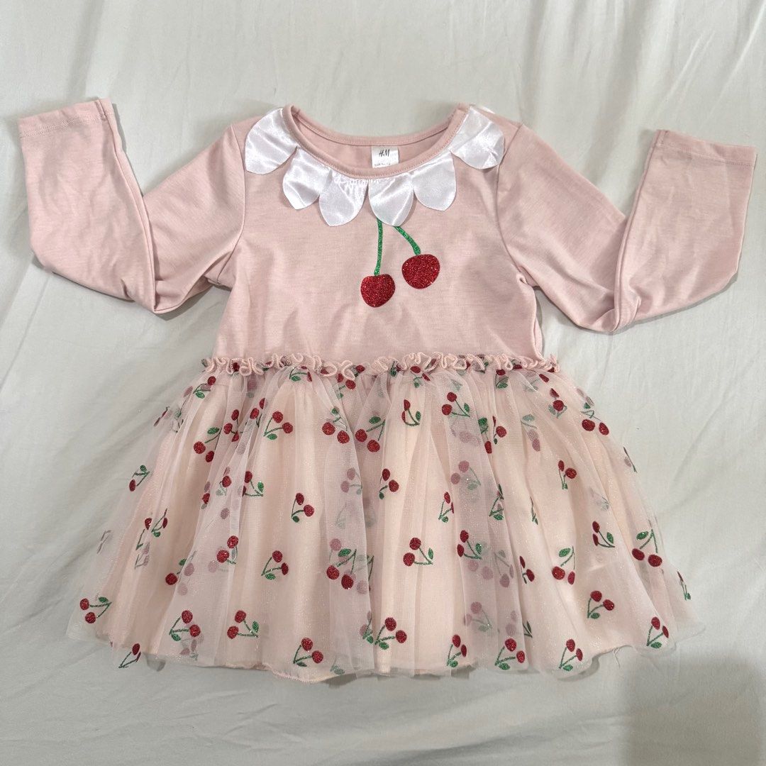 1-2T H&M Cherry Print Dress Costume (Category: Babies & Kids Fashion) located in Pasig City. Submitted by speciallyselected (Listing ID 1437953305, Image 2). Description: - H&M dress for baby girls - Pink long-sleeved top with white collar - Cherry applique detail - Layered tulle skirt with cherry print - Size: 18 months to 2 years old - Perfect for your little one!.