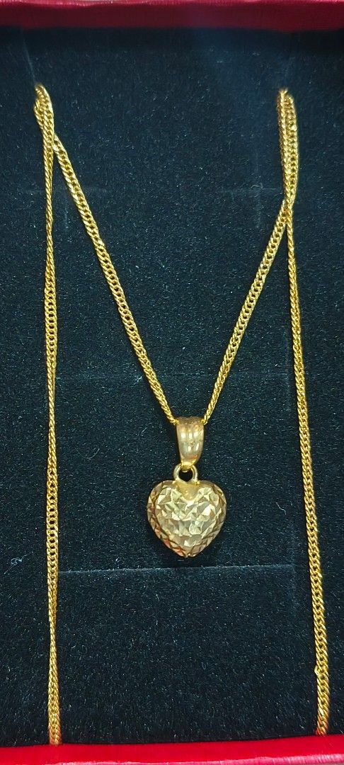 18K Gold Heart Necklace (Category: Necklaces) located in Pasig City. Submitted by lfboutique (Listing ID 1438014011, Image 2). Description: - 18K Solid Gold Chain 1.51g - Faceted Heart Pendant - Lightweight & Comfortable - Perfect for Everyday Wear - Timeless Design - Comes with box pasig loc no cod.