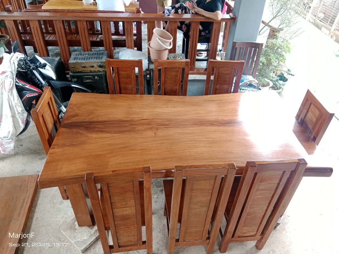 8-seater Mahogany Dining Table Set with 8 Chair (Category: Tables & Sets) located in Orani. Submitted by mbfb_btn (Listing ID 1437992916, Image 3). Description: - Wooden dining set MAHOGANY - Large rectangular table - Matching chairs - Rich, warm wood tone - Sturdy design - Ideal for everyday use and special occasions - Ample seating and spacious tabletop Can do Delivery within Central Luzon or Metro Manila.
