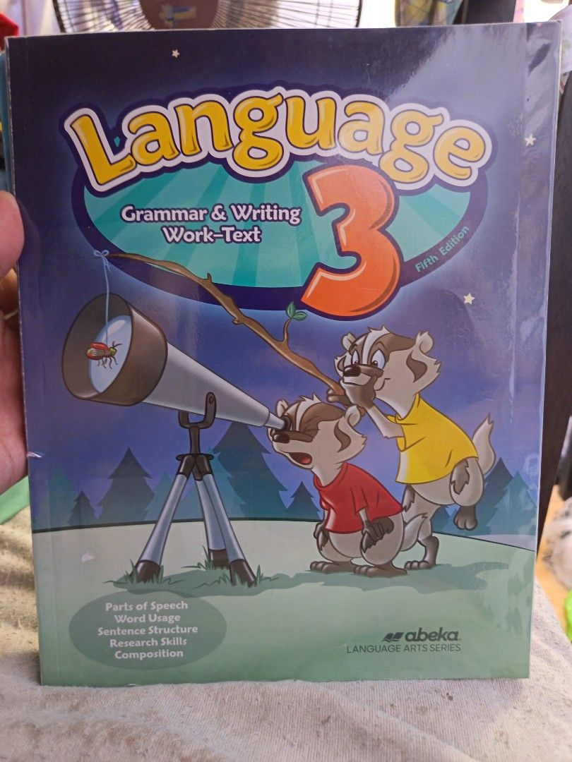 Abeka Language 3 Grammar & Writing Work-Text Abeka Fifth Edition (Category: Textbooks) located in Manila. Submitted by mookiemonster (Listing ID 1437969146, Image 1). Description: - Abeka Language 3 Work-Text - Fifth Edition - Focuses on grammar, writing, and research - Includes parts of speech and sentence structure - Features the Abeka Language Arts Series - Illustrated with cartoon badgers - Minimal writings and check marks.