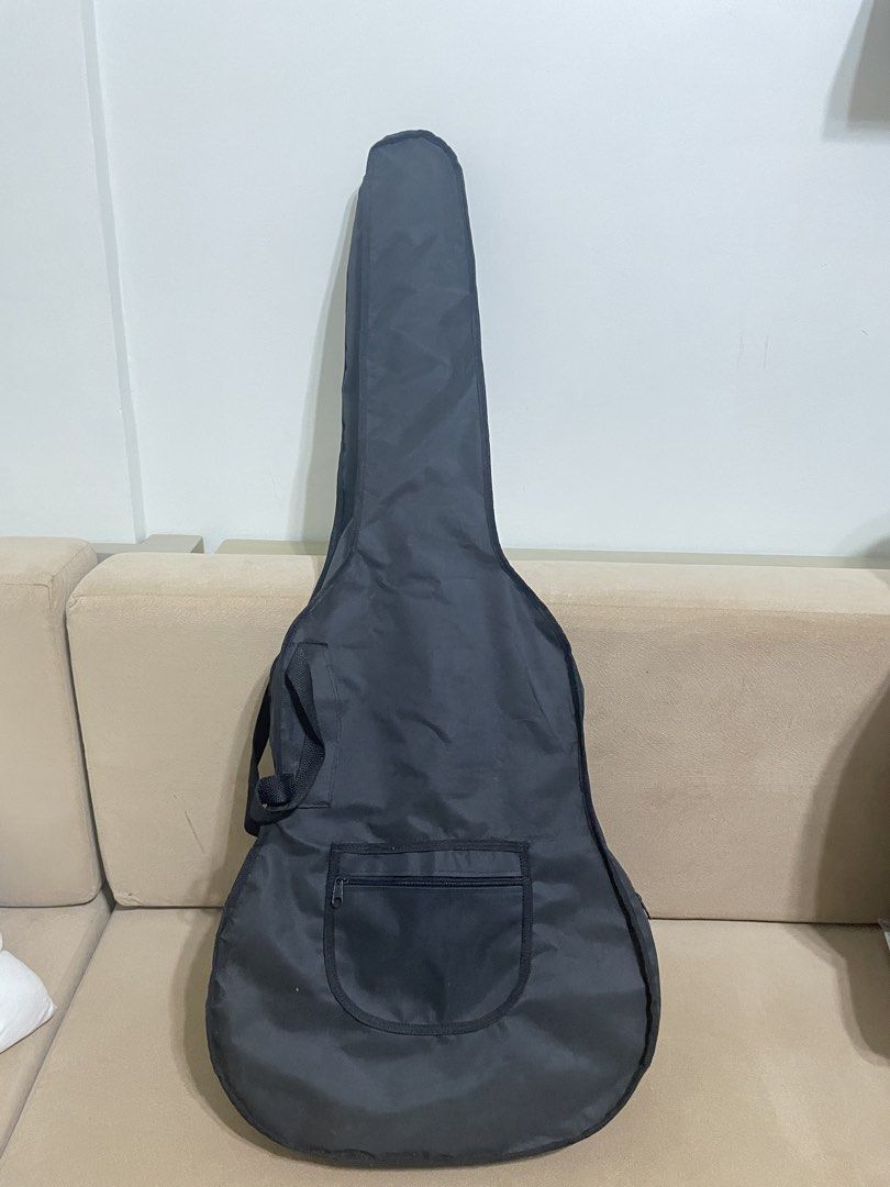 Acoustic Guitar with Case (Category: Musical Instruments) located in Abucay. Submitted by az.sells (Listing ID 1438040773, Image 3). Description: - Roxwood acoustic guitar - Black and red finish - Includes a black carrying case - Cutaway design - Parlor guitar size - Negotiable.