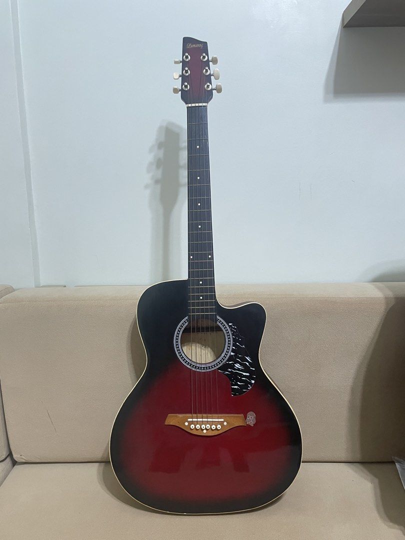 Acoustic Guitar with Case (Category: Musical Instruments) located in Abucay. Submitted by az.sells (Listing ID 1438040773, Image 1). Description: - Roxwood acoustic guitar - Black and red finish - Includes a black carrying case - Cutaway design - Parlor guitar size - Negotiable.