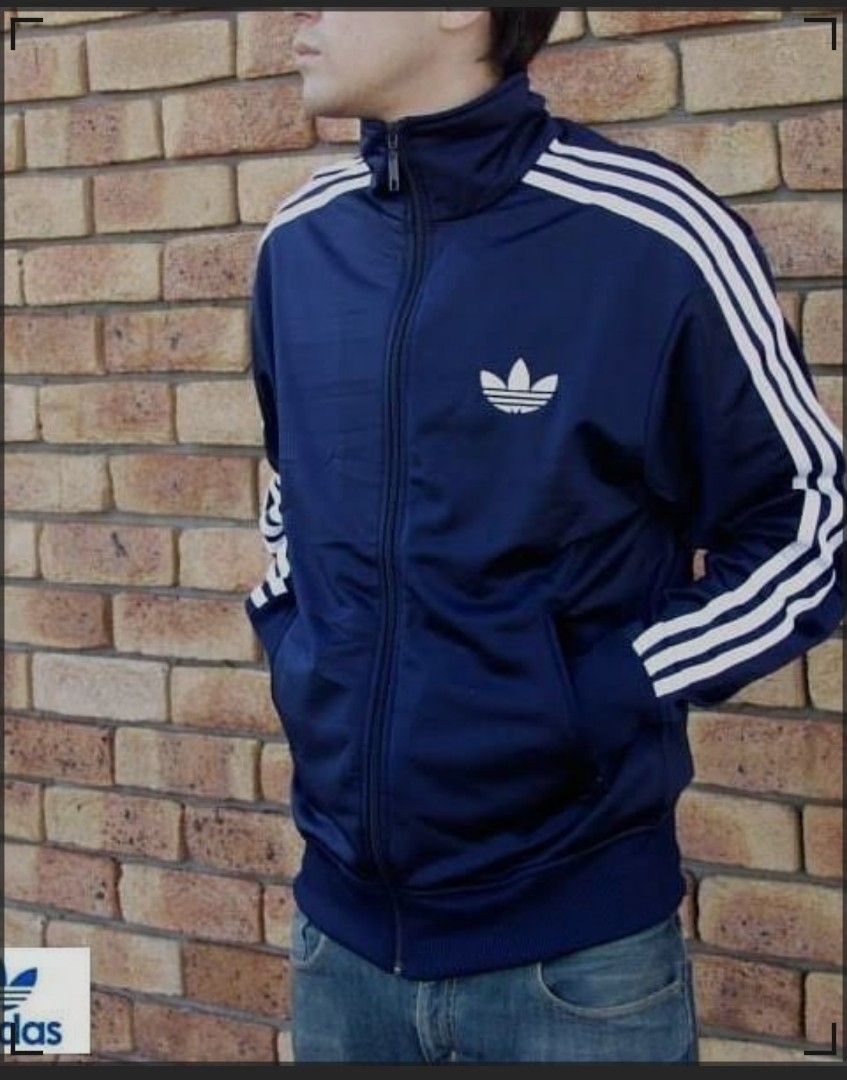 Adidas Firebird Track Jacket, Length - 26, Width - 18 (Category: Coats, Jackets and Outerwear) located in Manila. Submitted by paul.c29cruz (Listing ID 1438074559, Image 1). Description: - Adidas track jacket - Navy blue with white stripes - Adidas trefoil logo - Full zip closure - Two side pockets 100% ORIGINAL! In good condition pa Galing US! 4k+ pa yan kapag bibilin mo sa mall. Message me for more pics. :) Thanks .