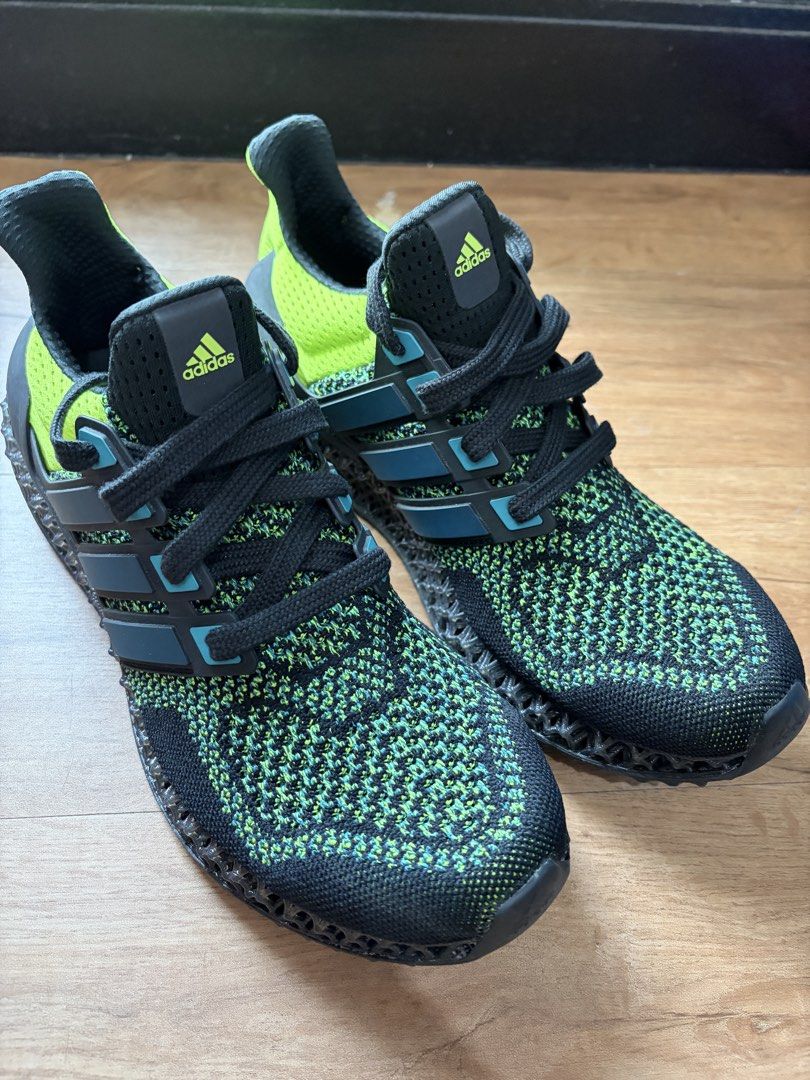 Adidas Ultra 4D Sneakers (Category: Sneakers) located in Mandaluyong City. Submitted by prelovedbypaii (Listing ID 1438032437, Image 2). Description: - Adidas Ultra 4D sneakers - Color: Green and Black - Size: US 9.5 - in very good condition - original price at 14k, selling at 6k only Pickup in Mandaluyong, can also do meetups.