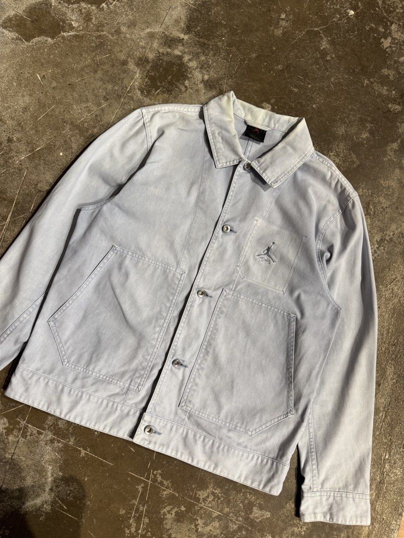 Air Jordan Essential Chicago Workwear Blue Jacket (Category: Coats, Jackets and Outerwear) located in Cavite. Submitted by dracokidstuff (Listing ID 1438039717, Image 2). Description: Air Jordan Essential Chicago Workwear Blue Jacket Size: Large Dimes: W22.5 L27 SL25 Very good condition Issue slight yellowish stain on collar - Light blue Jordan jacket - Size: L - Button closure - Features Jordan logo on chest - Two front pockets - Collar and butt