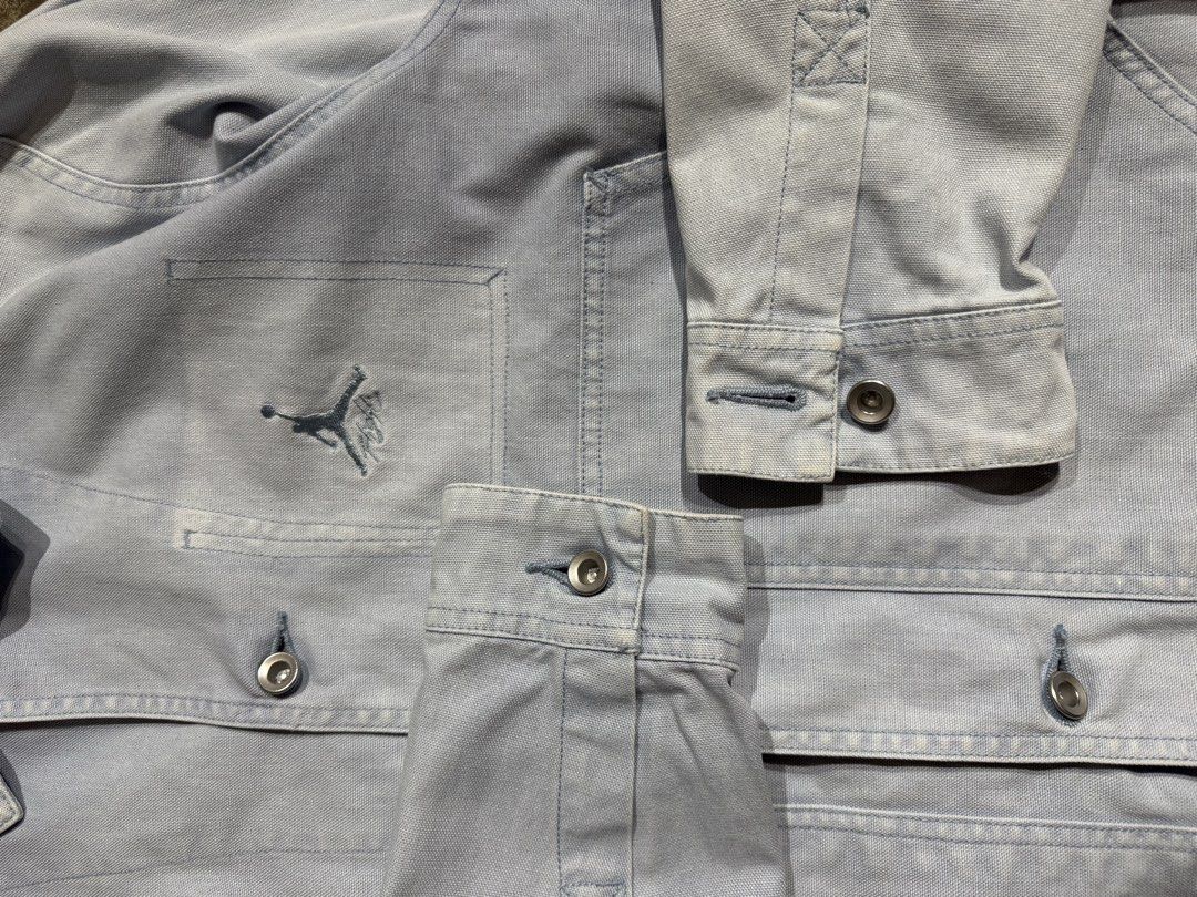 Air Jordan Essential Chicago Workwear Blue Jacket (Category: Coats, Jackets and Outerwear) located in Cavite. Submitted by dracokidstuff (Listing ID 1438039717, Image 3). Description: Air Jordan Essential Chicago Workwear Blue Jacket Size: Large Dimes: W22.5 L27 SL25 Very good condition Issue slight yellowish stain on collar - Light blue Jordan jacket - Size: L - Button closure - Features Jordan logo on chest - Two front pockets - Collar and butt