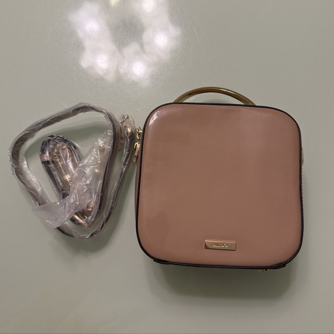 Aldo Brown Beige Hand/ Body Bag (Category: Cross-body Bags) located in Calamba. Submitted by dress2impress_ (Listing ID 1437955136, Image 2). Description: - last pic in comparison with iphone 15 pro.