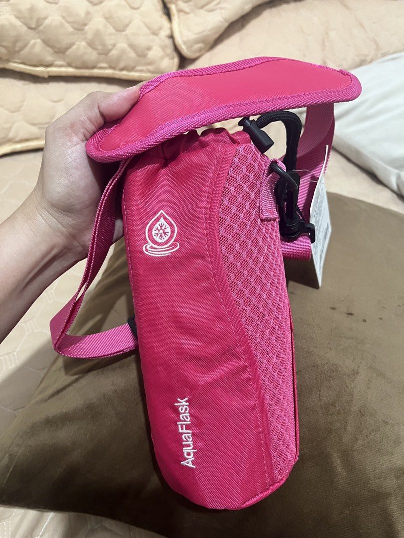 AquaFlask Water Bottle Carrier with Strap (Category: Water Bottles & Tumblers) located in Imus. Submitted by nettreasures.ph (Listing ID 1438093308, Image 2). Description: Brandnew & original aquaflask bag no issue w/ tag 800 2pcs - AquaFlask water bottle carrier - Adjustable strap for easy carrying - Drawstring closure - Mesh side for breathability - Small pocket for essentials - Available colors: Pink and Beige - Keeps your water bottle secure 