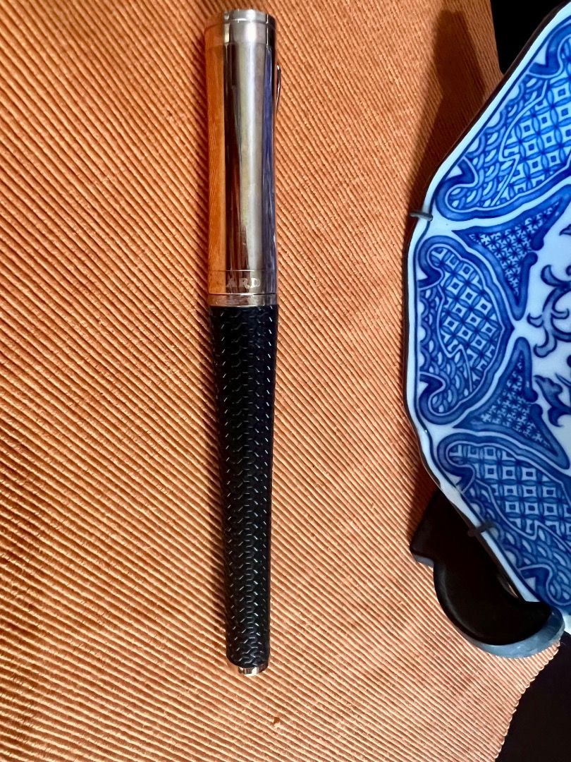 Authentic Chopard Classic Racing Rose-Gold Tone Rollerball Pen (Category: Luxury Accessories) located in Sorsogon. Submitted by zenhawk-51d3 (Listing ID 1438003967, Image 3). Description: - Chopard ballpoint pen - Black textured grip - Rose- gold tone cap - Chopard logo engraved on cap - Includes refill but almost dried-up - Stylish writing instrument.