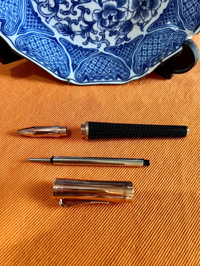 Authentic Chopard Classic Racing Rose-Gold Tone Rollerball Pen (Category: Luxury Accessories) located in Sorsogon. Submitted by zenhawk-51d3 (Listing ID 1438003967, Image 1). Description: - Chopard ballpoint pen - Black textured grip - Rose- gold tone cap - Chopard logo engraved on cap - Includes refill but almost dried-up - Stylish writing instrument.
