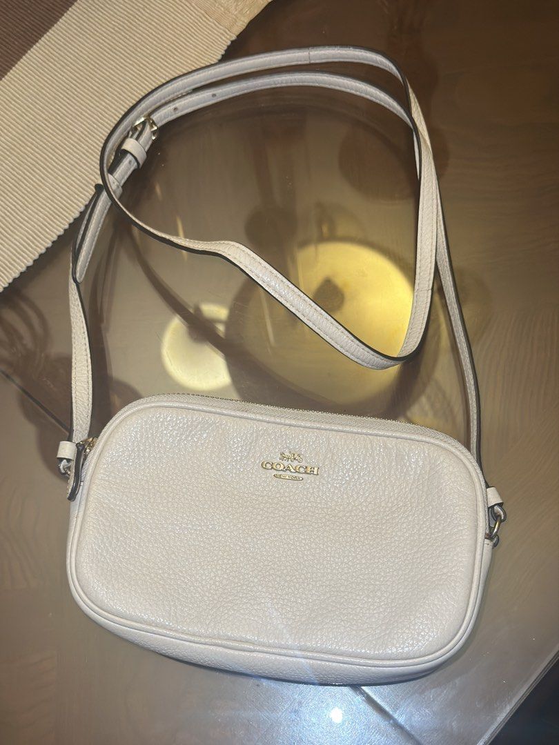 Authentic Coach White Double Zip Crossbody Bag (Category: Luxury Bags & Wallets) located in Manila. Submitted by kindtsunami (Listing ID 1438081120, Image 3). Description: Lp: 2000. Price firm Authentic Coach Bought from USA Lightly used. Needs some cleaning. Some small stains in the back (see pics) can be cleaned .