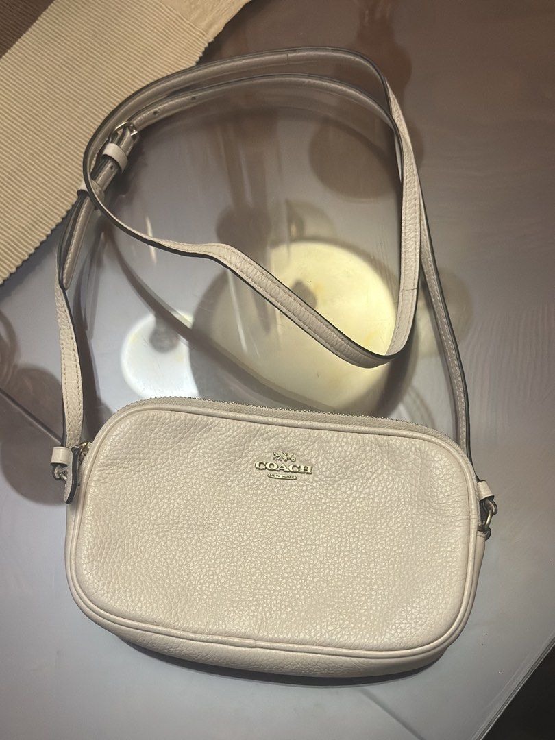 Authentic Coach White Double Zip Crossbody Bag (Category: Luxury Bags & Wallets) located in Manila. Submitted by kindtsunami (Listing ID 1438081120, Image 1). Description: Lp: 2000. Price firm Authentic Coach Bought from USA Lightly used. Needs some cleaning. Some small stains in the back (see pics) can be cleaned .