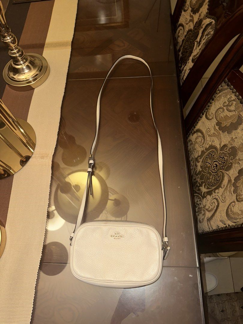 Authentic Coach White Double Zip Crossbody Bag (Category: Luxury Bags & Wallets) located in Manila. Submitted by kindtsunami (Listing ID 1438081120, Image 2). Description: Lp: 2000. Price firm Authentic Coach Bought from USA Lightly used. Needs some cleaning. Some small stains in the back (see pics) can be cleaned .