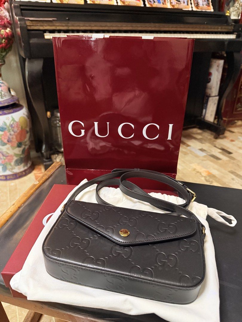 Authentic GG Crossbody Leather Pochette (Category: Luxury Bags & Wallets) located in Pasig City. Submitted by leldebeer (Listing ID 1437938358, Image 2). Description: Complete inclusion - box, paper bag, receipt, dust bag Bought Brand new in Japan.