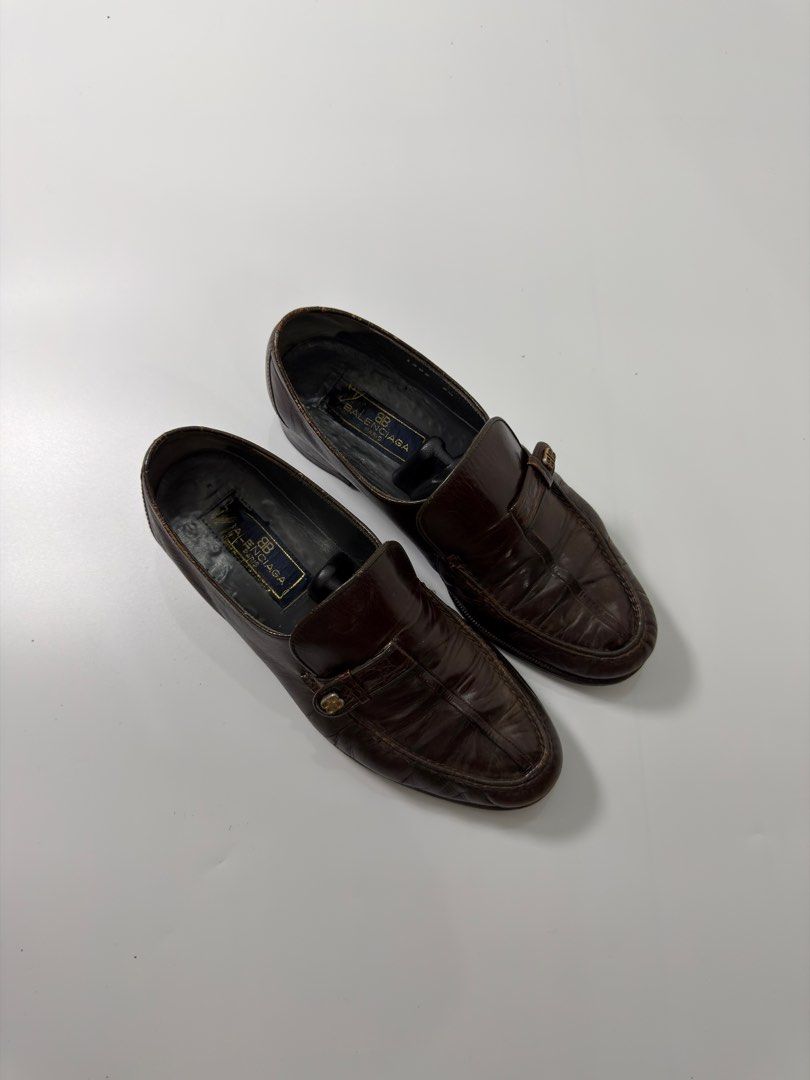 Balenciaga Brown Leather Loafers (Category: Loafers) located in Alfonso. Submitted by jbcamet (Listing ID 1438064861, Image 1). Description: - Balenciaga loafers - Brown leather - Size: 6.5 - Slip-on design - Decorative strap with Balenciaga logo - Textured leather upper - Leather lining - Made in Italy - Soles show wear.