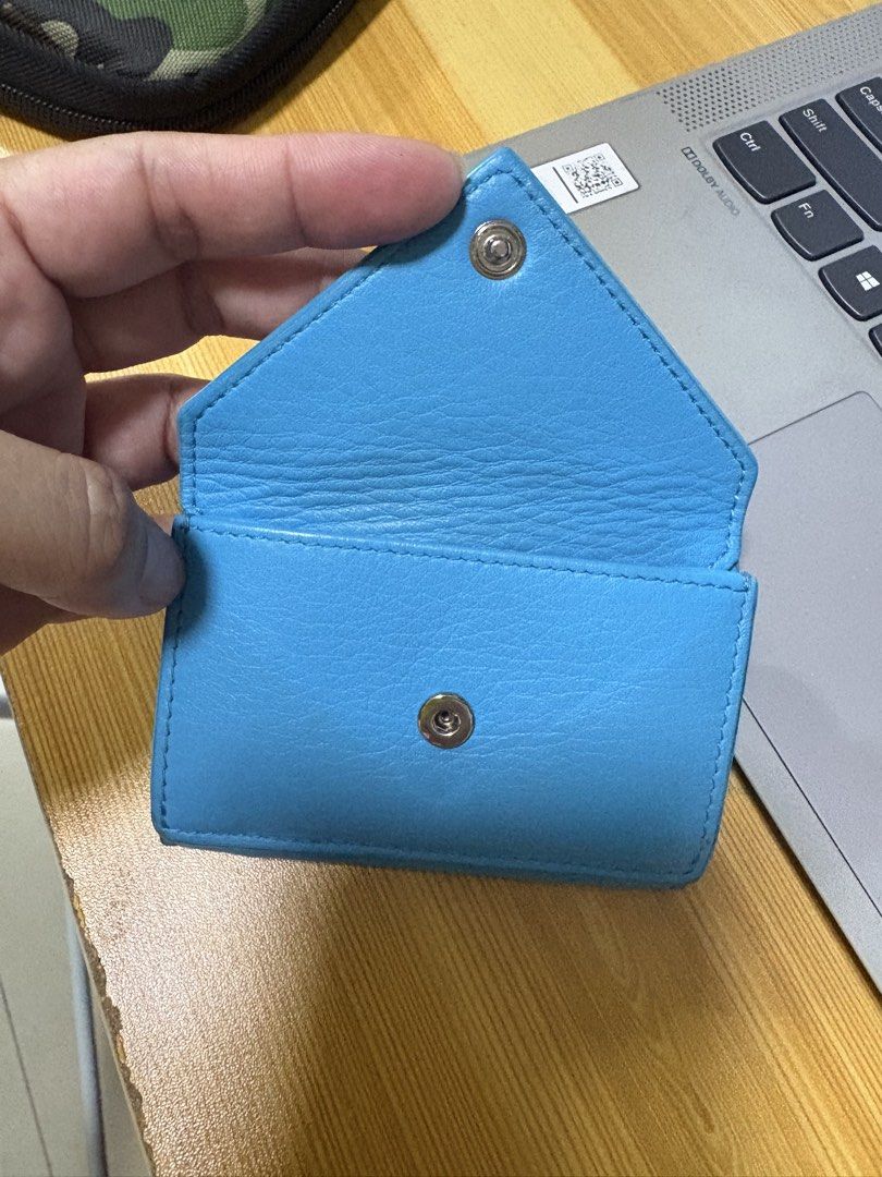 Balenciaga wallet authentic (Category: Luxury Bags & Wallets) located in Malolos. Submitted by 3Coolitz (Listing ID 1437977621, Image 2). Description: Missing button can be bought to Mr. Quickie for repair. Please see posted photos. This is a steal price Mas mura pa sa coach wallet price mga siss! .