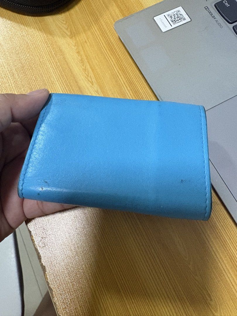 Balenciaga wallet authentic (Category: Luxury Bags & Wallets) located in Malolos. Submitted by 3Coolitz (Listing ID 1437977621, Image 3). Description: Missing button can be bought to Mr. Quickie for repair. Please see posted photos. This is a steal price Mas mura pa sa coach wallet price mga siss! .