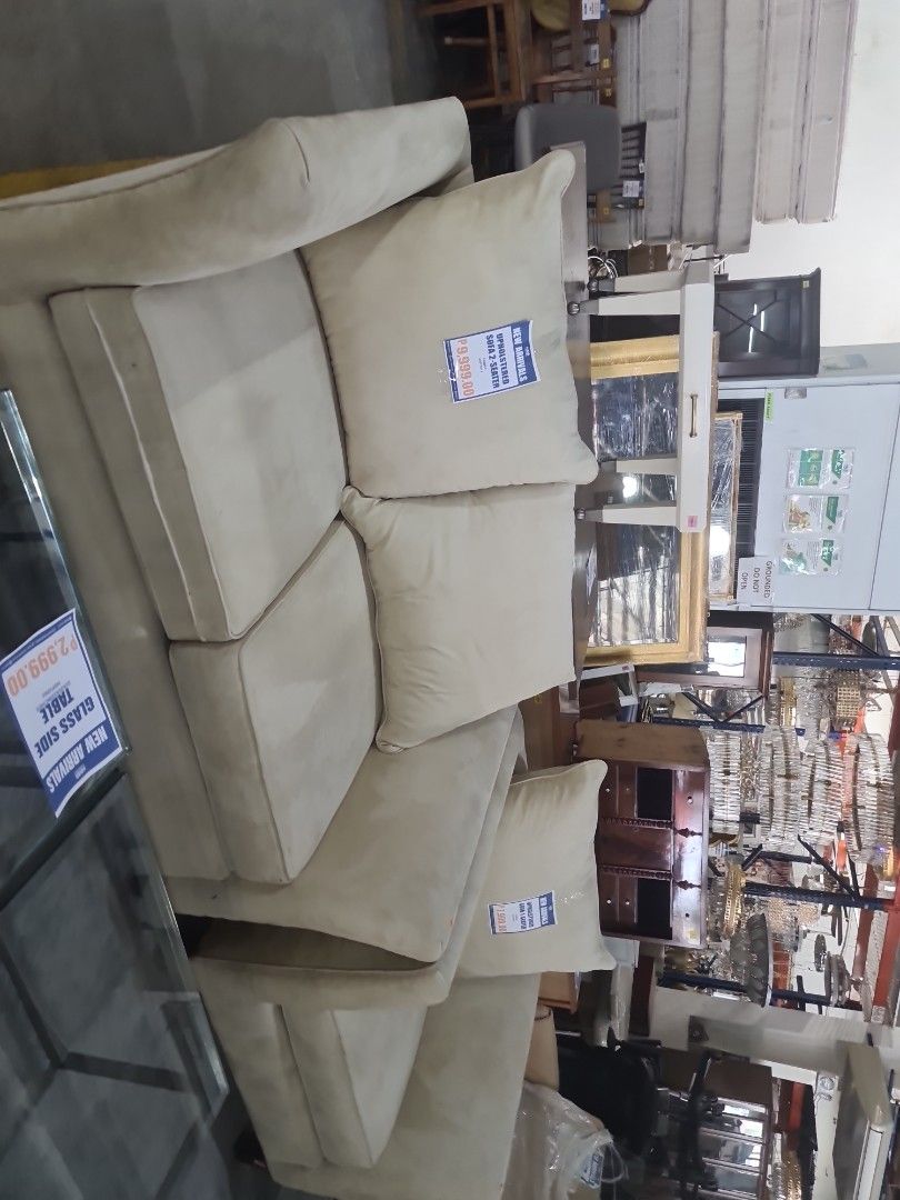 Beige Fabric Sofa Set (Category: Sofas) located in Makati City. Submitted by mandiajan62104 (Listing ID 1437987363, Image 1). Description: - Beige fabric sofa set - Includes a two-seater sofa and a single-seater sofa - Classic design - Comfortable cushions - Ideal for living rooms and lounge areas - Creates a cozy space.