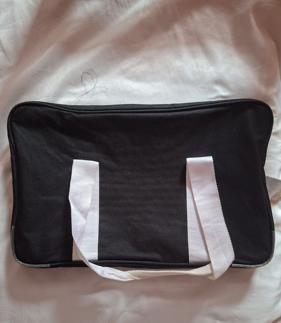 Japanese Canvas Black Shoulder/Body bag (Category: Luxury Bags & Wallets) located in Cavite. Submitted by graciously_good (Listing ID 1437998919, Image 2). Description: - Black Canvas Japanese school bag with free adjustable strap - Can be used for cosplay - Needs cleaning - Refer to photos for issues - Color may differ due to lighting and camera settings MEASUREMENTS (if filled): - Length: 15.5" - Width: 4.5" - Height: 9.5".