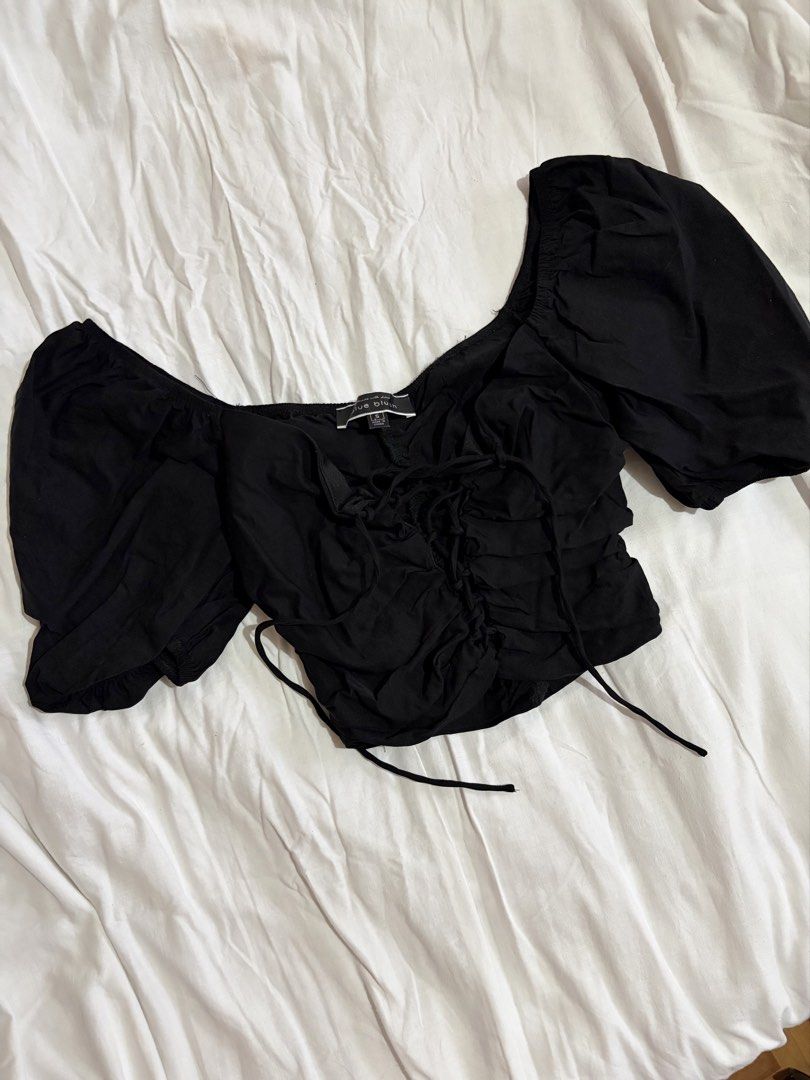 Blue Blush Black Puff Sleeve Top (Category: Blouses) located in Manila. Submitted by andreacap (Listing ID 1437967139, Image 1). Description: - Blue Blum black top - Size: Small - Features: - Puff sleeves - Tie-up front - Square neckline - Ruching details - Made of lightweight fabric - Suitable for casual and dressy occasions 🎀 currently decluttering/selling pre-loved clothes, check my page for more details! 🎀 please manage expectations, you ma