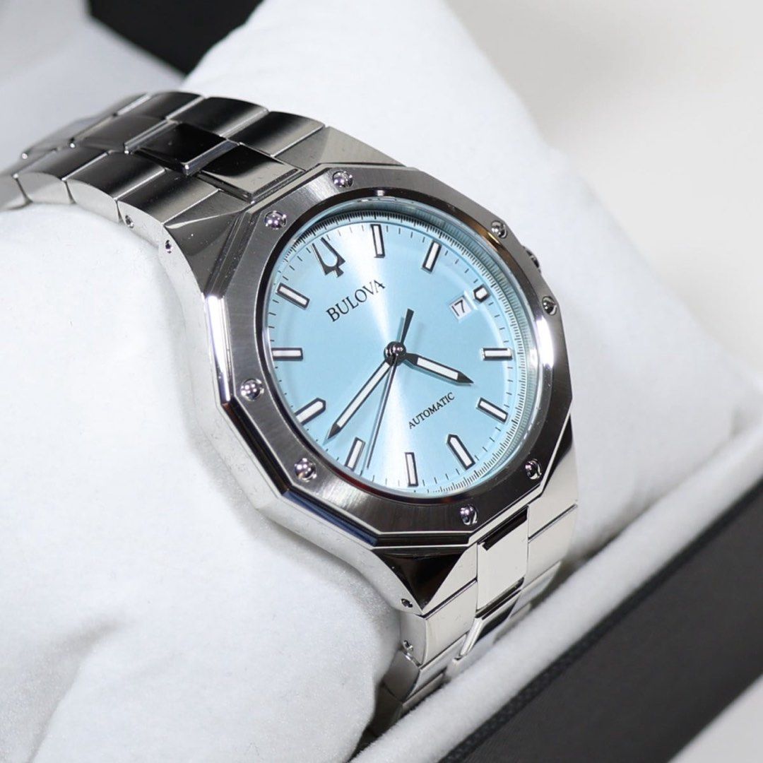 Bulova Classic Light Blue Dial Men's Automatic Watch 96B462 (Category: Men's Watches) located in Taguig. Submitted by andykun03 (Listing ID 1438015153, Image 2). Description: Bulova Classic Light Blue / Tiffany Blue 96B462 Condition: BRAND NEW 19,999.00 FEATURES: Automatic Movement 21 Jewels Date Display Analog Display Push/Pull Crown Stainless Steel Case Stainless Steel Bracelet Sapphire Crystal ( rated 9 on Mohs Scale) Fixed Bezel Folding Clasp
