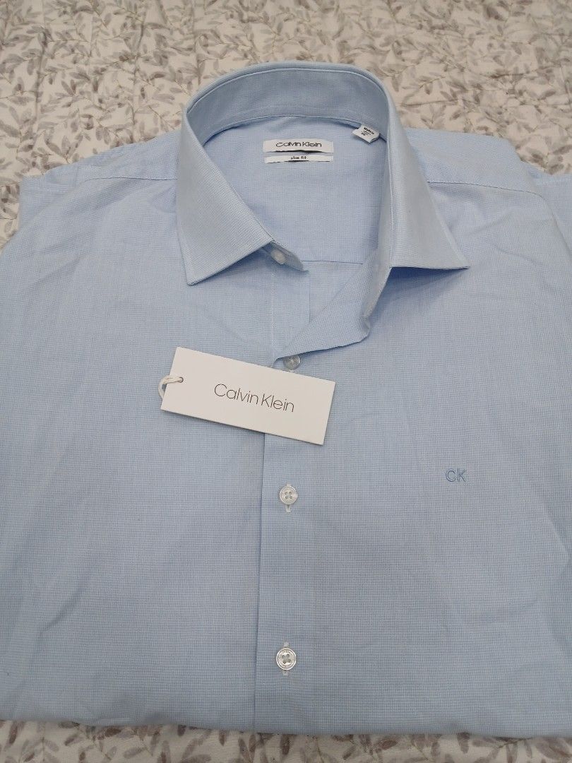 CALVIN KLEIN SLIM FIT LONG SLEEVE (Category: Tshirts & Polo Shirts ) located in Mabalacat. Submitted by michelle.m.d. (Listing ID 1438048770, Image 3). Description: Branded, brand new Size 40/86 Length 28 Chest 20.
