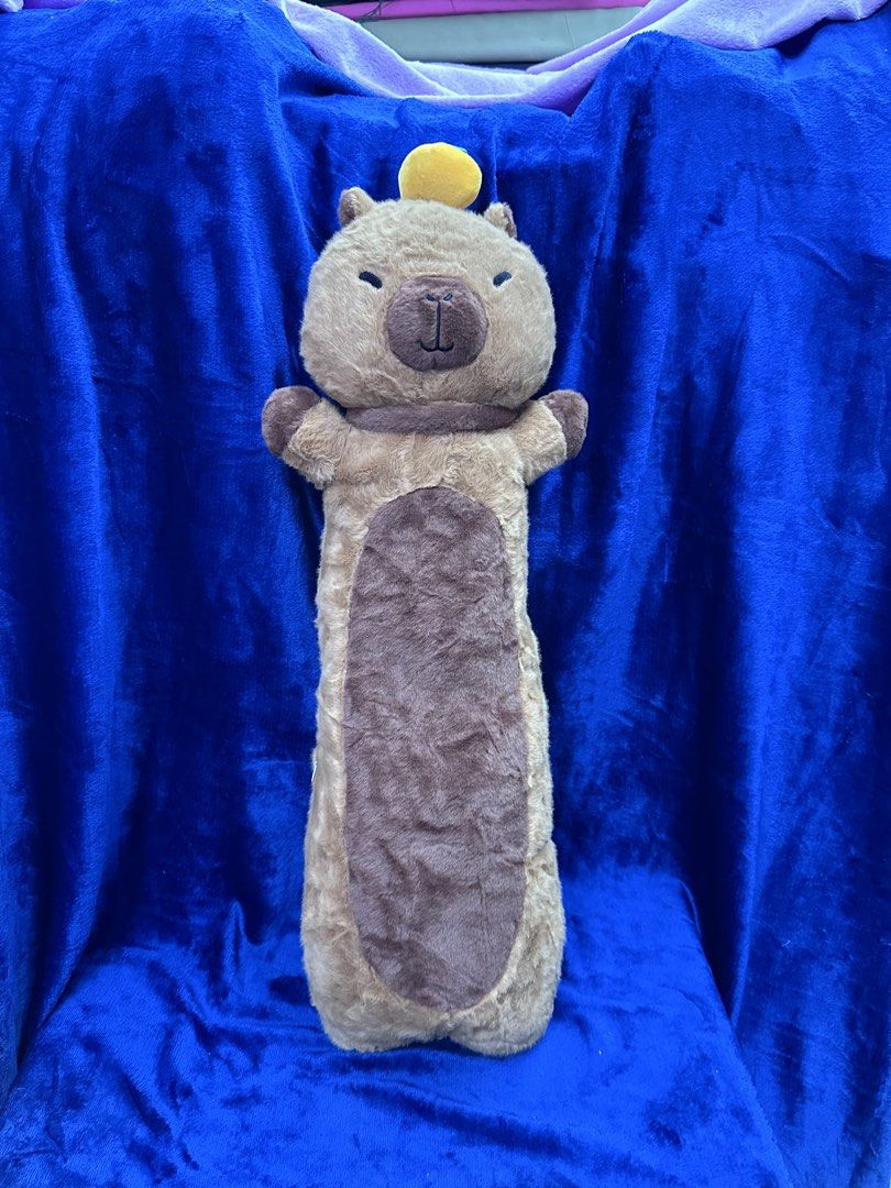 Capybara Hotdog Pillow (Category: Plushies & Soft Toys) located in Manila. Submitted by rinasclutter (Listing ID 1438030117, Image 1). Description: 🇨🇳 Direct from China ✈️ Brand New and Nice Quality 💯✨ 📏 65cm length — sakto pang-display, cuddle, or collection 🫶 .