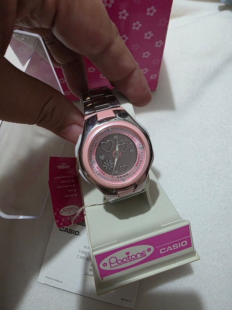 Casio Baby-G Pink Watch POPTONE (Category: Women's Watches) located in Bocaue. Submitted by wendy.plew (Listing ID 1438079203, Image 2). Description: - Casio Baby-G watch POPTONE - Pink and silver design - Includes: Original box, warranty card, and tag - Stainless steel band - Pink dial with heart and flower details -I beleive this watch is discountinued and is sought after some is looking through a bidding or auction sites . -Model: LCF-10D-4A (