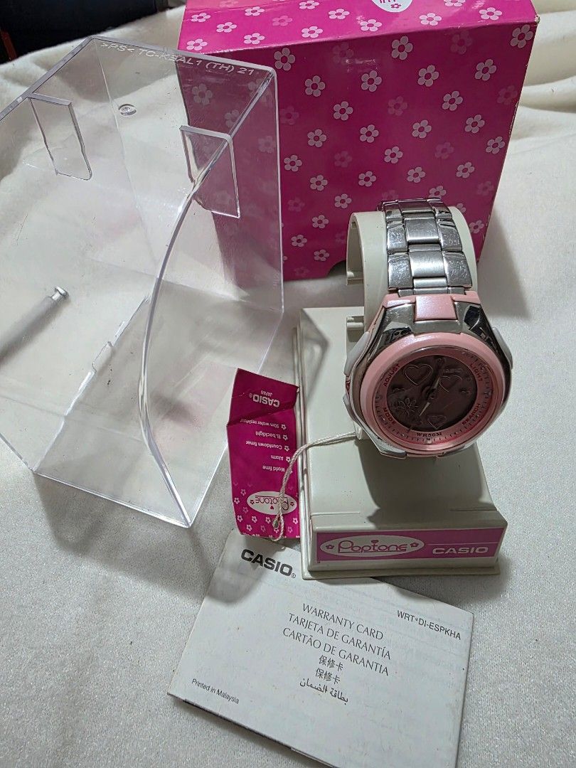 Casio Baby-G Pink Watch POPTONE (Category: Women's Watches) located in Bocaue. Submitted by wendy.plew (Listing ID 1438079203, Image 1). Description: - Casio Baby-G watch POPTONE - Pink and silver design - Includes: Original box, warranty card, and tag - Stainless steel band - Pink dial with heart and flower details -I beleive this watch is discountinued and is sought after some is looking through a bidding or auction sites . -Model: LCF-10D-4A (