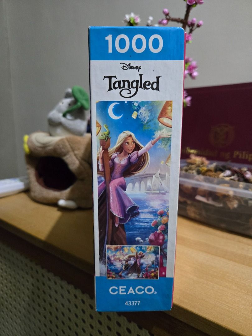 CEACO Disney Tangled Jigsaw Puzzle 1000 Pieces (Category: Board Games & Puzzles) located in Makati City. Submitted by preowned_preloved_makati (Listing ID 1438063446, Image 3). Description: CEACO Disney Tangled Jigsaw Puzzle 1000 Pcs 📍Makati City 🧩 Php 900 - SF shouldered by buyer - Php 50 off the total if you buy 3 puzzles - Can do meet up in One Ayala/ SM Makati/ Glorietta/ Landmark/ Greenbelt No issue. Haven't opened yet..