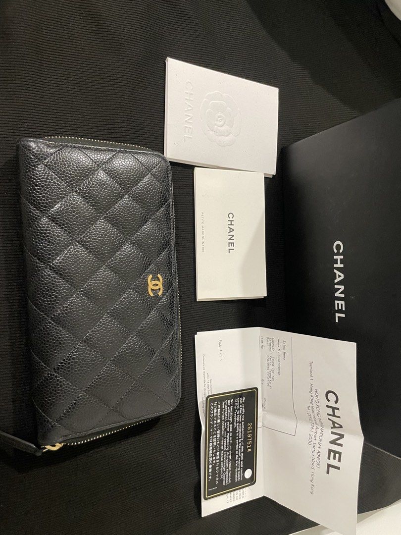 Chanel Caviar Leather Zip Around Wallet (Category: Luxury Bags & Wallets) located in Manila. Submitted by luxury889 (Listing ID 1438080854, Image 1). Description: - Authentic Chanel wallet - Black caviar leather - Iconic CC logo - Gold-tone zipper - Includes: original box, authenticity card, care booklet.
