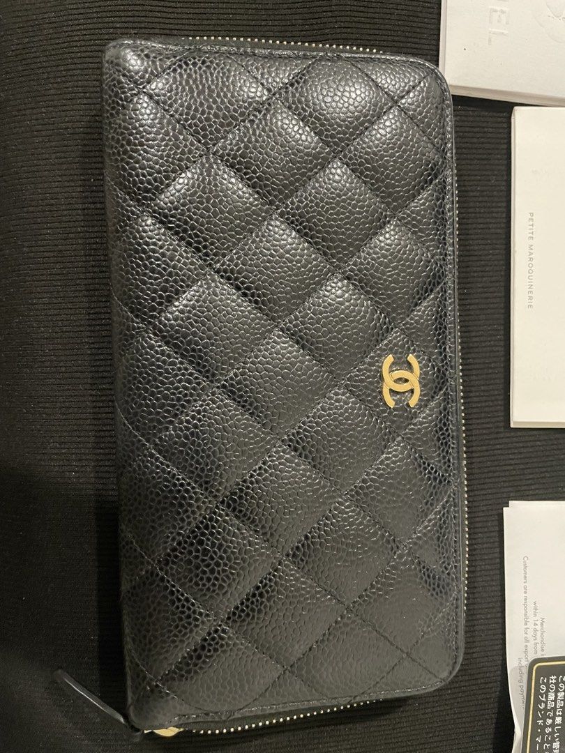 Chanel Caviar Leather Zip Around Wallet (Category: Luxury Bags & Wallets) located in Manila. Submitted by luxury889 (Listing ID 1438080854, Image 2). Description: - Authentic Chanel wallet - Black caviar leather - Iconic CC logo - Gold-tone zipper - Includes: original box, authenticity card, care booklet.