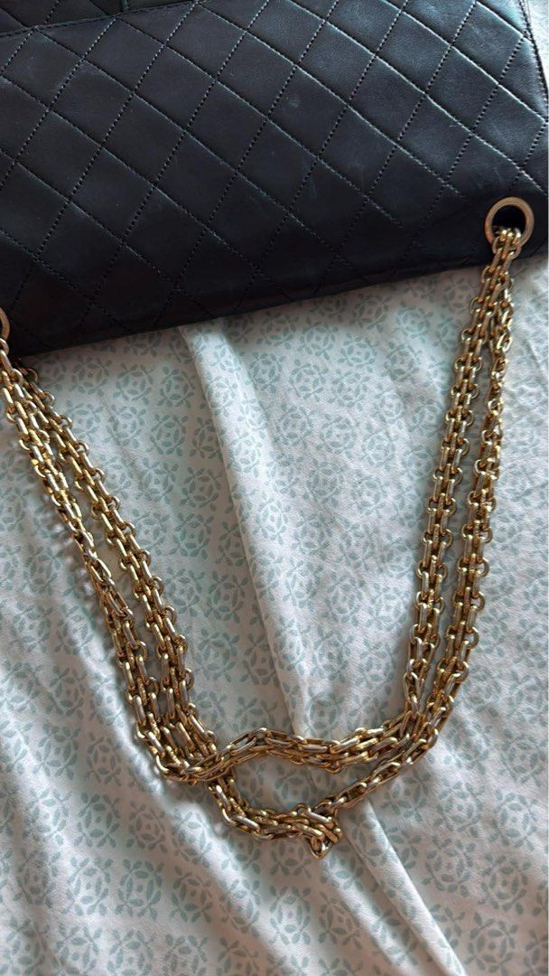 Chanel Vintage Lambskin Shoulder Bag (Category: Luxury Bags & Wallets) located in Cebu City. Submitted by siennakats (Listing ID 1437954094, Image 3). Description: - Authentic Chanel shoulder bag - Color: Black - Hardware: Gold-tone - Design: Quilted - Strap: Chain - Closure: Flap with CC turn-lock - Interior: Zippered pocket - Condition: Shows wear on corners and edges.