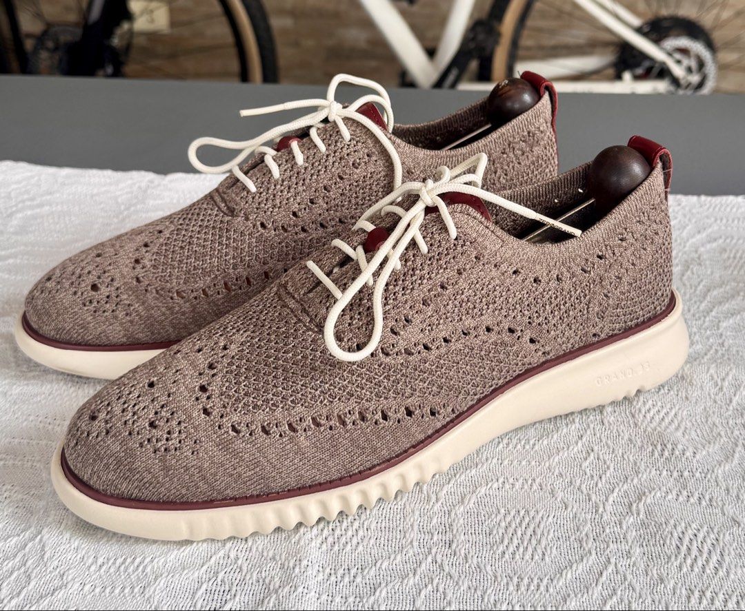 Cole Haan 2.zerogrand Stichlite in Truffle-Ivory (Category: Casual Shoes) located in Paranaque City. Submitted by sole2squeeze (Listing ID 1437990730, Image 1). Description: - Cole Haan Grand.OS knit oxford shoes - Neutral brown knit upper - White laces - Ivory-colored sole with burgundy trim - Burgundy leather heel detail - Excludes shoe trees.