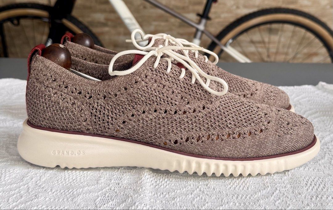 Cole Haan 2.zerogrand Stichlite in Truffle-Ivory (Category: Casual Shoes) located in Paranaque City. Submitted by sole2squeeze (Listing ID 1437990730, Image 2). Description: - Cole Haan Grand.OS knit oxford shoes - Neutral brown knit upper - White laces - Ivory-colored sole with burgundy trim - Burgundy leather heel detail - Excludes shoe trees.