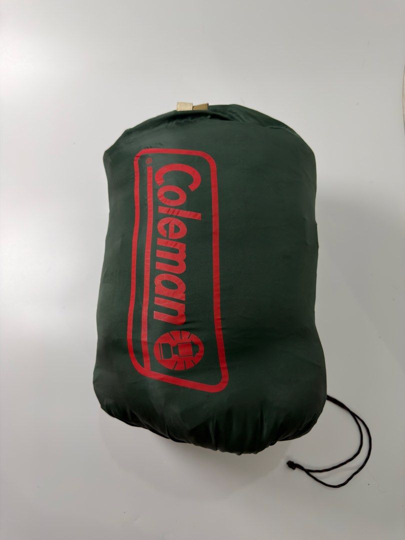 Coleman Sleeping Bag (Category: Hiking & Camping) located in Alfonso. Submitted by jbcamet (Listing ID 1438063310, Image 1). Description: - Coleman sleeping bag - Mummy style - Brown exterior - Plaid interior - Includes carrying bag - Zipper closure - Coleman logo visible.