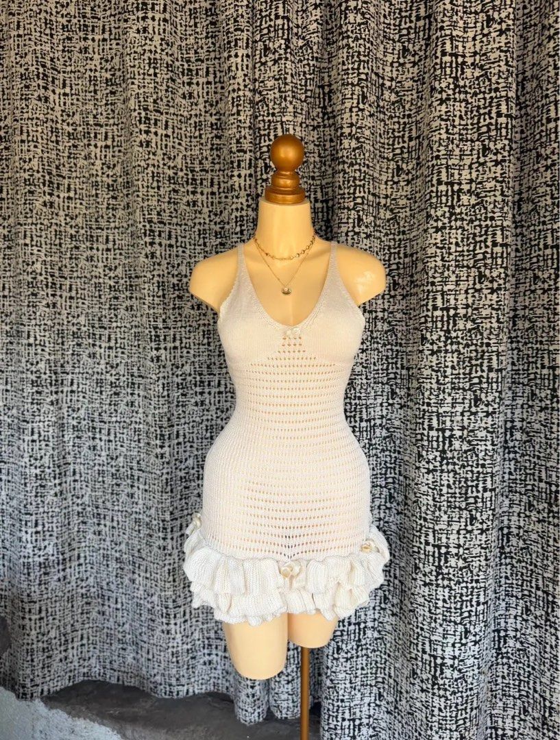 Crochet Mini Dress with Ruffle Hem (Category: Dresses) located in Dasmarinas. Submitted by sandyaaa_22 (Listing ID 1437951217, Image 1). Description: - Handmade crochet mini dress - Flattering V-neckline - Delicate spaghetti straps - Playful ruffle hem - Soft, lightweight yarn - Cream color - Ideal for summer or beach outings -medium to large - shell details on the dress - once used .