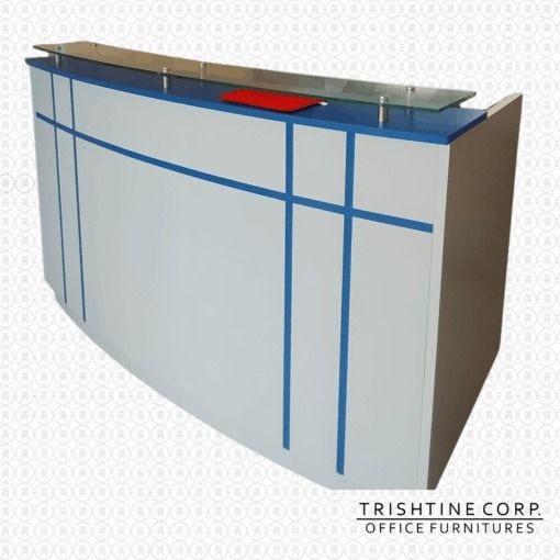 Curved Reception Desk with Glass Top (Category: Office Furniture & Fixtures) located in Caloocan City. Submitted by trishtine_jim9 (Listing ID 1437959604, Image 1). Description: - Elegant curved reception desk - Features a glass top - Stylish white, blue, and wood-tone finish - Includes a built-in drawer - Small cabinet with three drawers - Designed for office use - Branded "Trishtine Corp. Office Furnitures" DISCLAIMER: Price is for Posting Purp