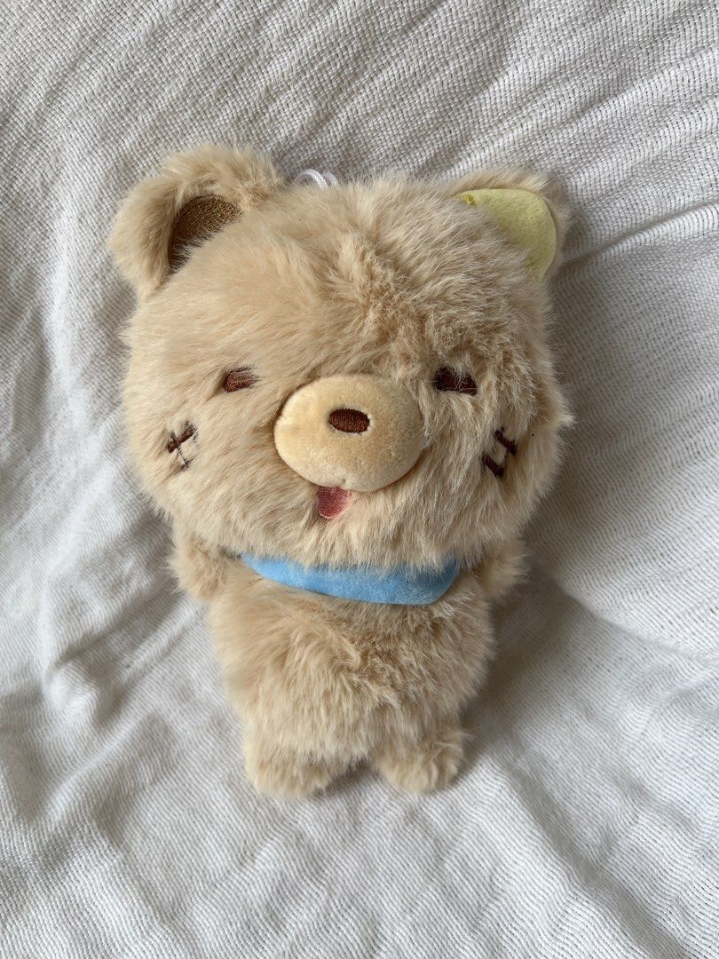 Cute Bear Plushie with Blue Scarf (Category: Plushies & Soft Toys) located in Manila. Submitted by prima_onda (Listing ID 1437986661, Image 1). Description: - Adorable plush bear - Light brown fur - Cute expression - Blue scarf - Stitched facial details - Small, handheld size - Loop for hanging.