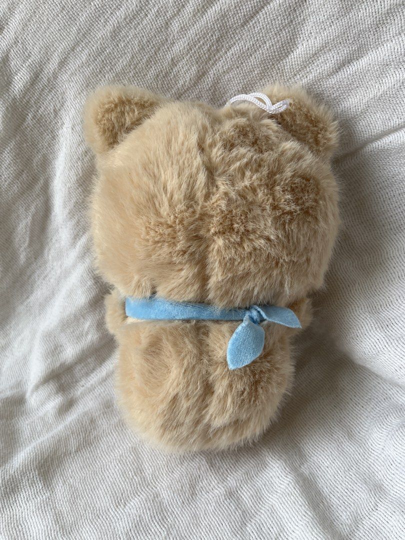 Cute Bear Plushie with Blue Scarf (Category: Plushies & Soft Toys) located in Manila. Submitted by prima_onda (Listing ID 1437986661, Image 2). Description: - Adorable plush bear - Light brown fur - Cute expression - Blue scarf - Stitched facial details - Small, handheld size - Loop for hanging.