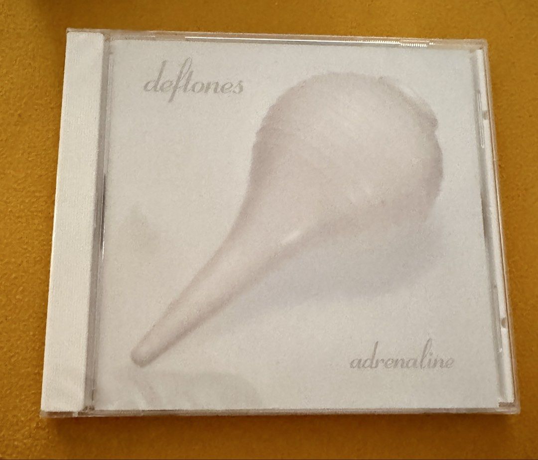 Deftones - Adrenaline CD Sealed Brand new (Category: CDs & DVDs) located in Pasig City. Submitted by proteinboy6 (Listing ID 1437981718, Image 2). Description: Create for me a listing for the attached CD. Highlight the hits, and say it’s sealed brand new CD, US pressed, ₱1400 rare..