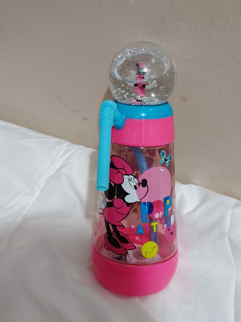 Disney Minnie Mouse Globe Water Bottle (Category: Water Bottles & Tumblers) located in Baguio. Submitted by amor-collects (Listing ID 1437957033, Image 1). Description: - Minnie Mouse water bottle - Features a snow globe top - Pink and blue design - Includes a straw - Authentic Disneyland sticker - Fun 'Pop of Attitude' design - Ideal for kids and Disney enthusiasts.