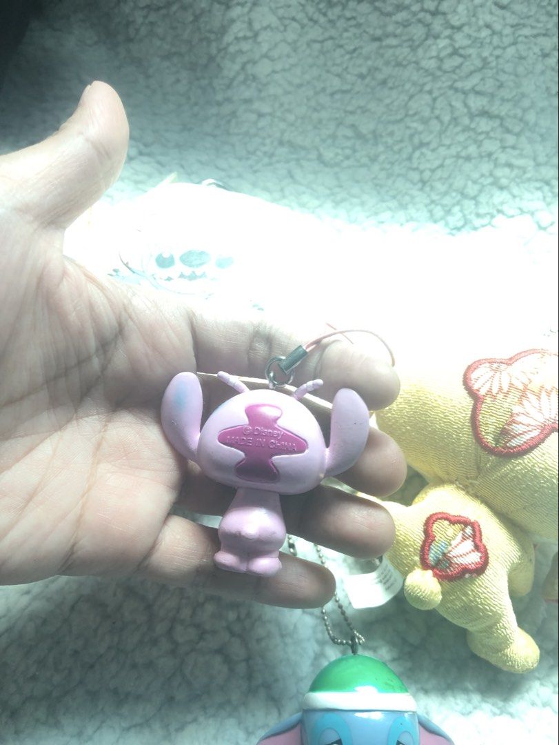 Disney Stitch Rare Charm, Pouch, & Keychains (Category: Character Goods) located in Manila. Submitted by konami_bjork (Listing ID 1408451809, Image 2). Description: Rare stitch charm and stitch pouch .