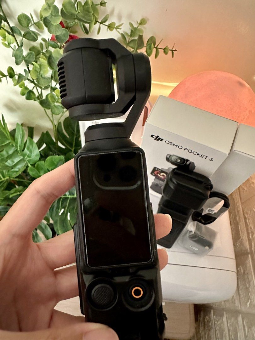 DJI Osmo Pocket 3 (Standard version) with complete accessories (Category: Cameras) located in Quezon City. Submitted by heymdc (Listing ID 1437989314, Image 3). Description: DJI Osmo Pocket 3 camera for sale 🌻 First owner. Well taken care of. Lady-owned. Has a screen protector since Day 1 and in pristine condition. No marks. COMPLETE ACCESSORIES. Comes with free: magnetic mount case, screen protector case, and freebies. Reason for sale: Upgradin