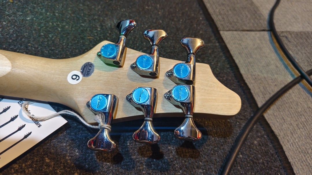 Electric Guitar with Star Inlays (Category: Musical Instruments) located in Pasig City. Submitted by tupriomichaeljohn (Listing ID 1438016129, Image 3). Description: - White electric guitar - Star inlays on fretboard - Features a tremolo system - Includes a black Fender gig bag - Comes with a set of new tuning pegs - Still wrapped in plastic.